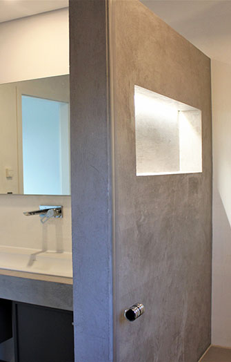 Concrete imitation bathroom wall