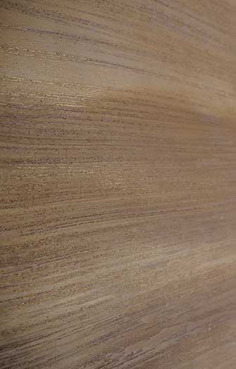 Wall design earth-coloured wood grain