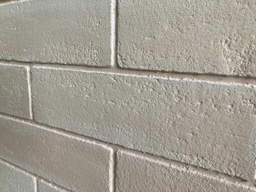 Mur de briques imitation enduit de marbre